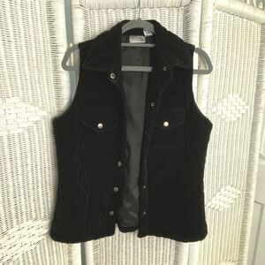 Black Quilted Vest Sleek Layering Piece Travel Friendly Minimalist Capsule Style